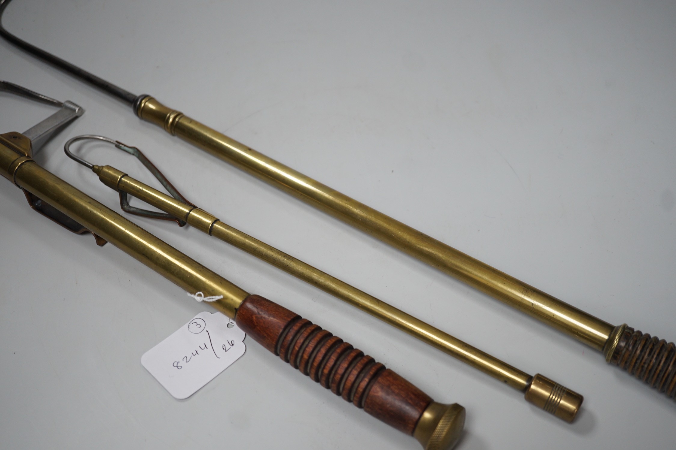 Three brass telescopic fishing gaffs